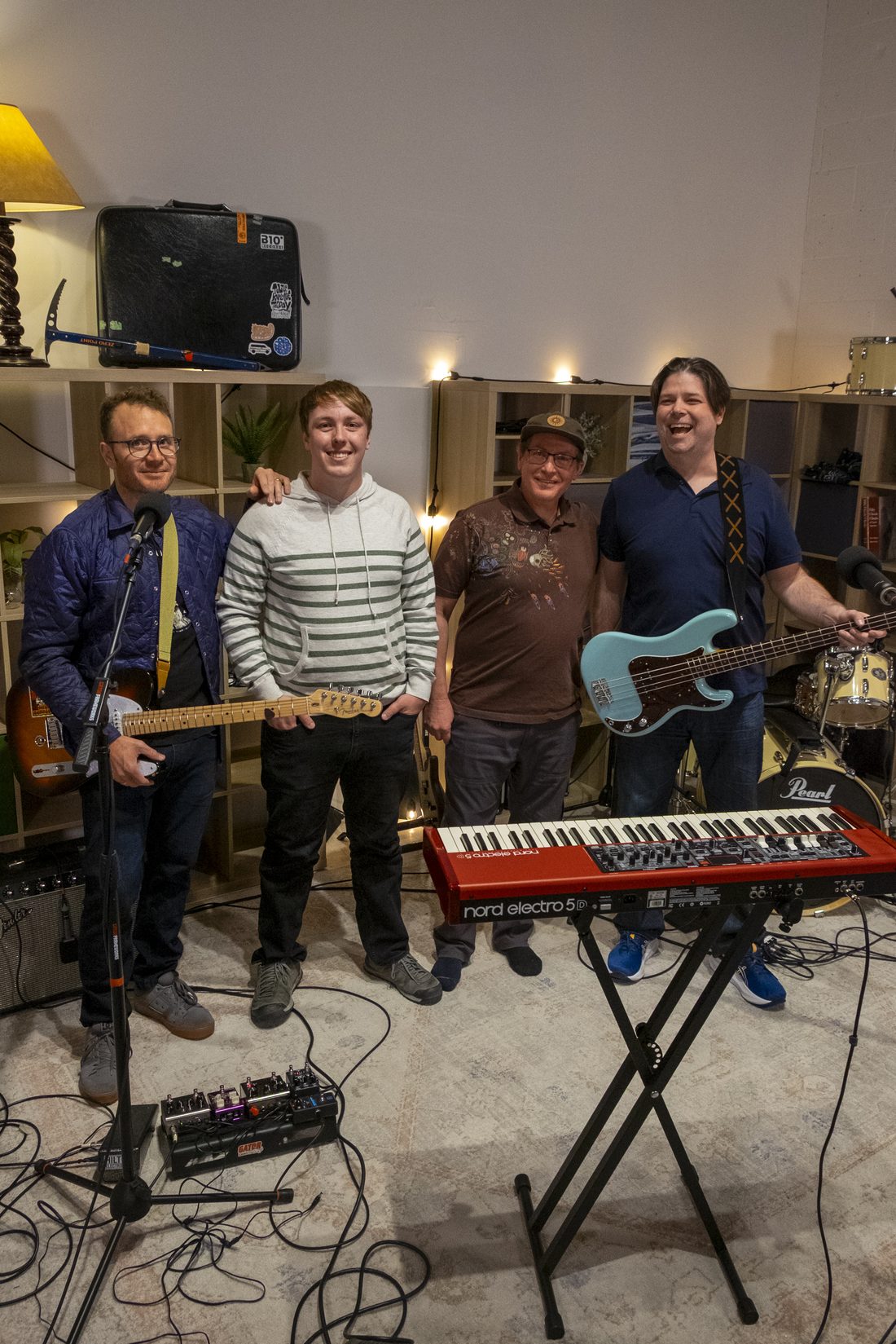 The band laughing together after a session
